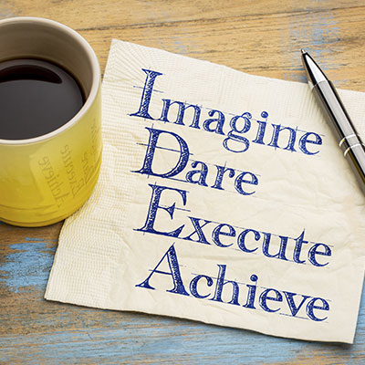 Note on a napkin Imagine, Dare, Execute, Achieve – what it takes to be different.